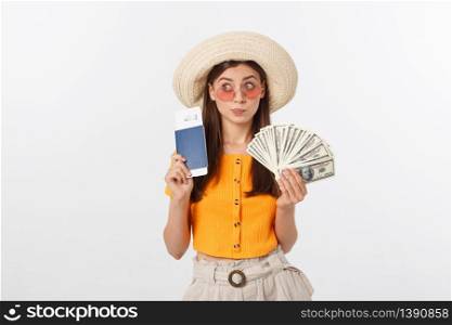 Portrait of cheerful, happy, laughing girl with hat on head, having money fan and passport with tickets in hands, isolated on white background.. Portrait of cheerful, happy, laughing girl with hat on head, having money fan and passport with tickets in hands, isolated on white background