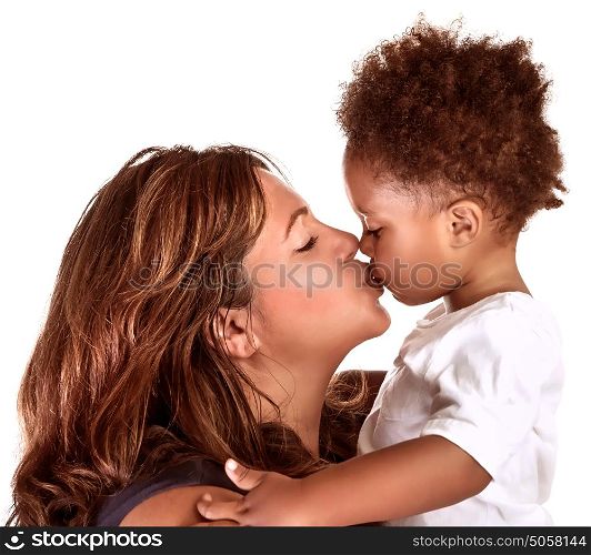 Portrait of cheerful mother kissing baby, studio shot, happy motherhood, lovely African family, happiness and love concept