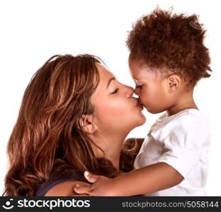 Portrait of cheerful mother kissing baby, studio shot, happy motherhood, lovely African family, happiness and love concept