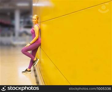 portrait of cheerful women with sportswear doing yoga pose at outdoor