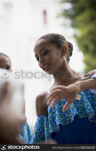 Portrait of children in traditional Plena attire, outdoors