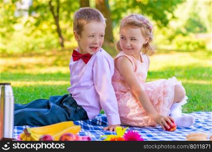 Portrait of children on a picnic in the park