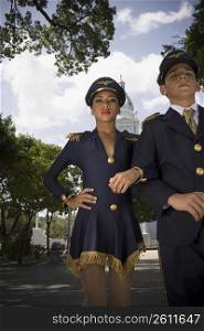 Portrait of children wearing pilot and flight attendant costume