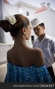 Portrait of children wearing Plena traditional attire, outdoors