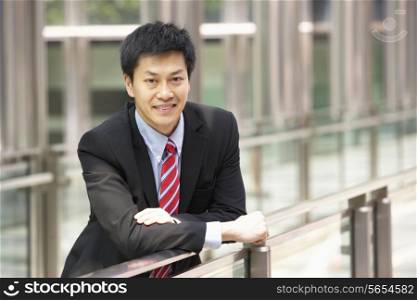 Portrait Of Chinese Businessman Outside Office