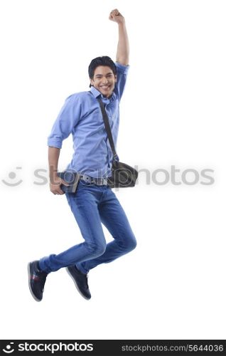 Portrait of college student jumping