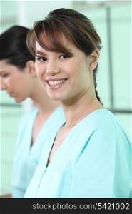 Portrait of confident Asian nurse