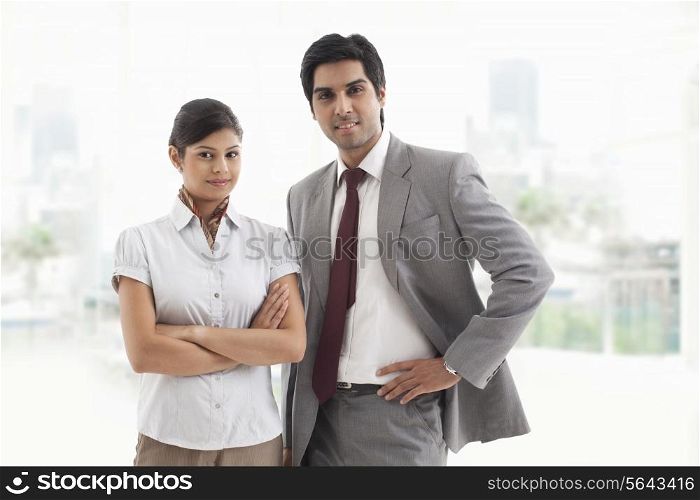 Portrait of confident business colleagues smiling together