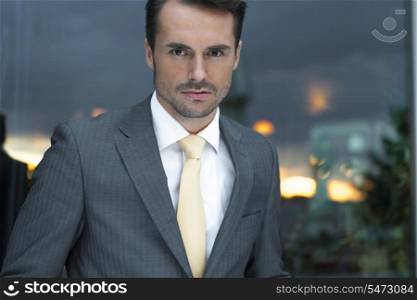 Portrait of confident businessman in office