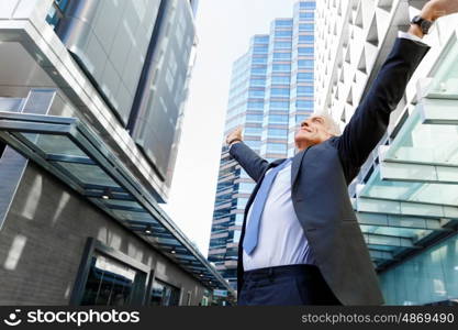 Portrait of confident businessman outdoors. Portrait of confident businessman in suit outdoors