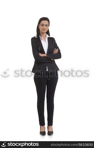 Portrait of confident businesswoman with arms crossed isolated over white background