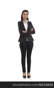 Portrait of confident businesswoman with arms crossed isolated over white background