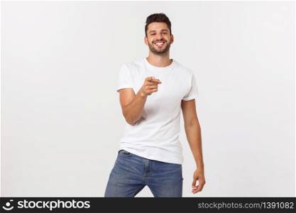 Portrait of confident handsome man holding his suit, isolated on white background.. Portrait of confident handsome man holding his suit, isolated on white background