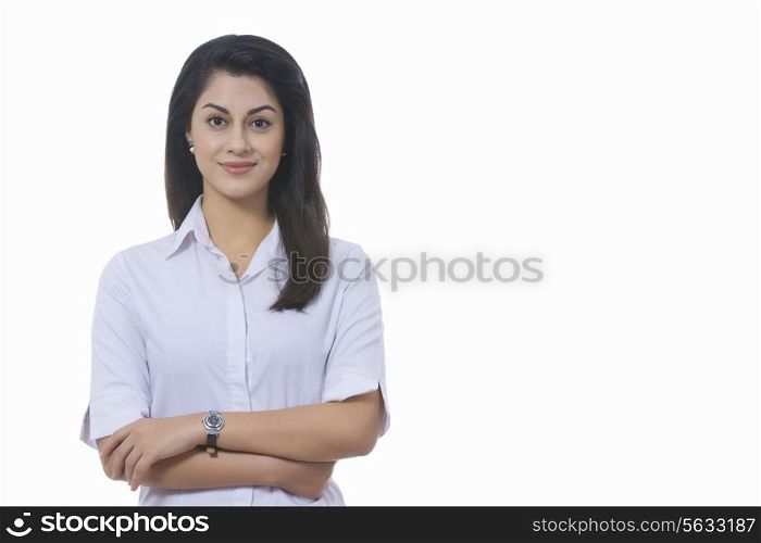 Portrait of confident Indian businesswoman against white background