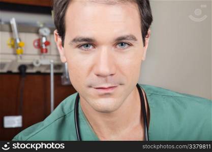 Portrait of confident male doctor in hospital