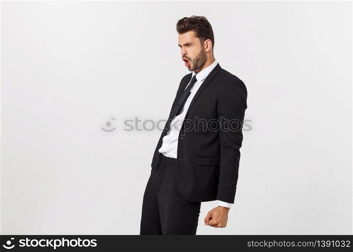 Portrait of confident mature businessman in formals standing isolated over white background.. Portrait of confident mature businessman in formals standing isolated over white background