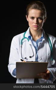 Portrait of confident medical doctor woman with clipboard