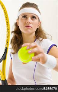 Portrait of confident tennis player ready to serve