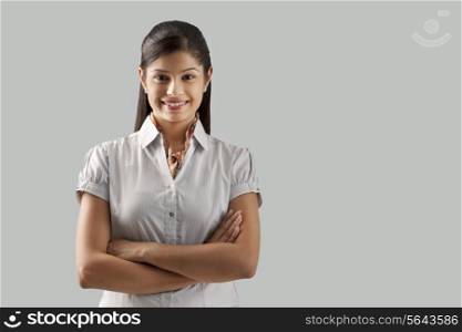 Portrait of confident young businesswoman smiling