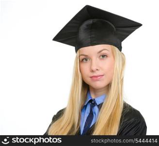 Portrait of confident young woman in graduation gown