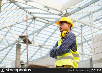 Portrait of construction engineer worker,Civil engineer checking work at the construction site.
