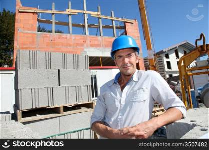 Portrait of construction worker with security helmet