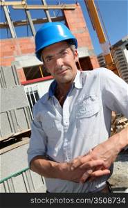 Portrait of construction worker with security helmet
