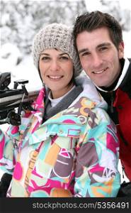 Portrait of couple in ski resort