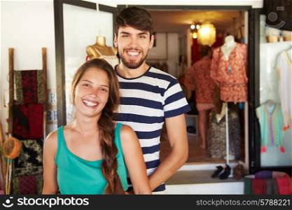 Portrait Of Couple Running Clothing Shop Together