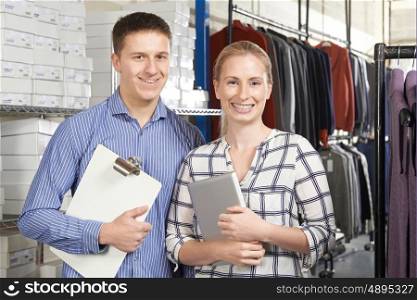 Portrait Of Couple Running On Line Fashion Business