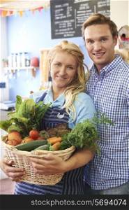 Portrait Of Couple Running Organic Food Shop
