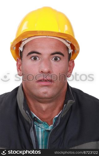 portrait of craftsman looking anguished