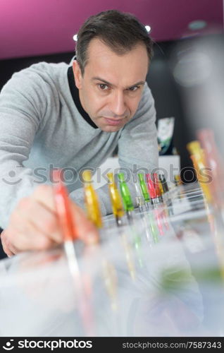 portrait of customer choosing e-cigarette