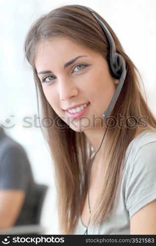Portrait of customer service woman with headphones