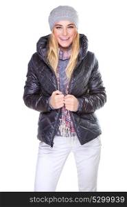 Portrait of cute blond girl wearing warm stylish jacket and hat isolated on white background, winter fashion concept