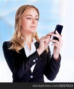 Portrait of cute businesswoman reading text message in the office, attractive business lady using modern internet device, success concept