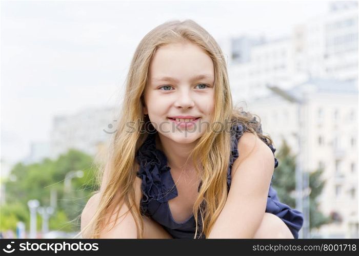 Portrait of cute girl with blond hair