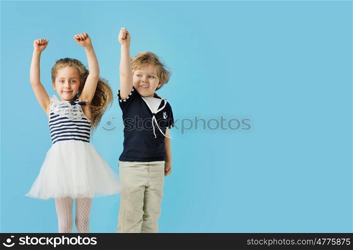 Portrait of cute jumping children