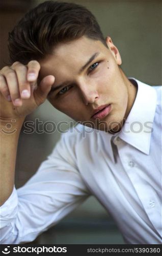 Portrait of Daydreaming Handsome Man Fashion Model in Reverie