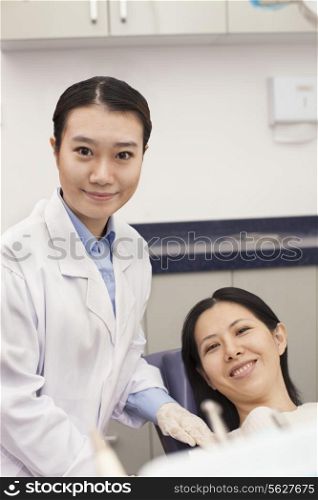 Portrait Of Dentist And Patient