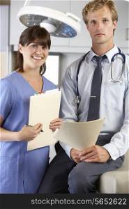 Portrait Of Doctor And Nurse In Doctor&#39;s Office
