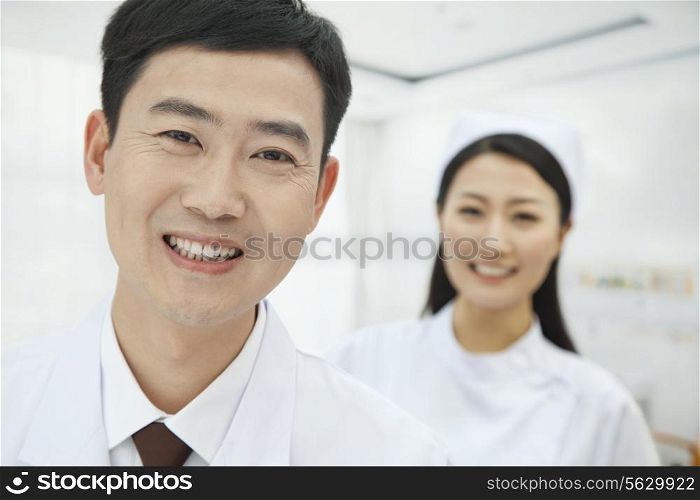 Portrait of Doctor, Nurse in Background