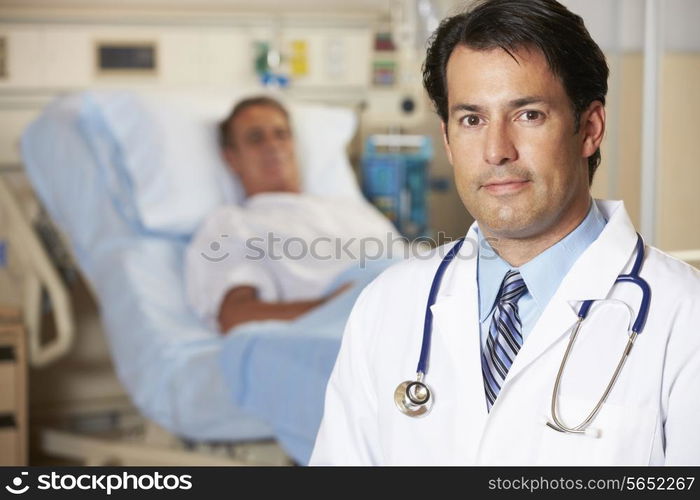 Portrait Of Doctor With Patient In Background