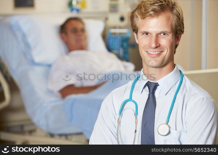 Portrait Of Doctor With Patient In Background