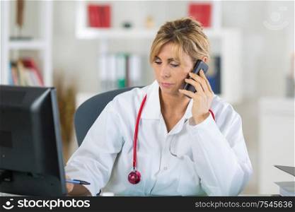 portrait of doctor with phone