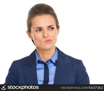 Portrait of doubting business woman