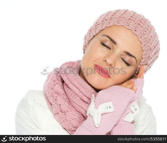 Portrait of dreaming woman in knit winter clothes