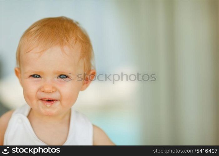 Portrait of eat smeared baby