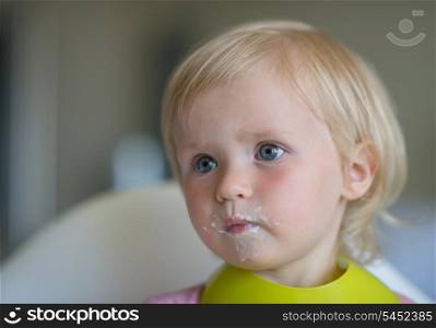 Portrait of eat smeared baby