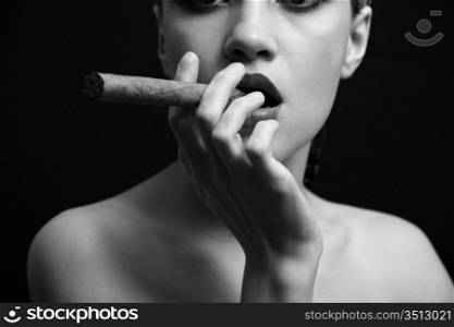 Portrait of elegant smoking woman. Fashion photo